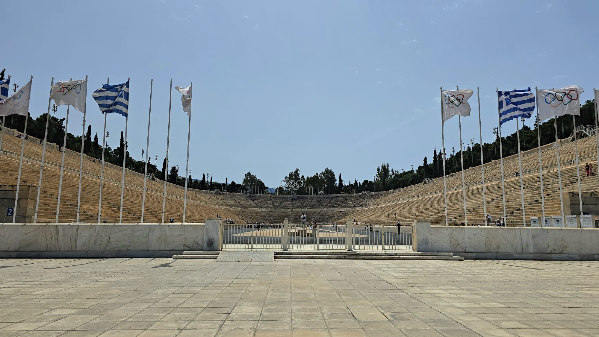 The Panathenaic Stadium in Athens — the all-marble ancient stadium with tiered seating, viewed from the track