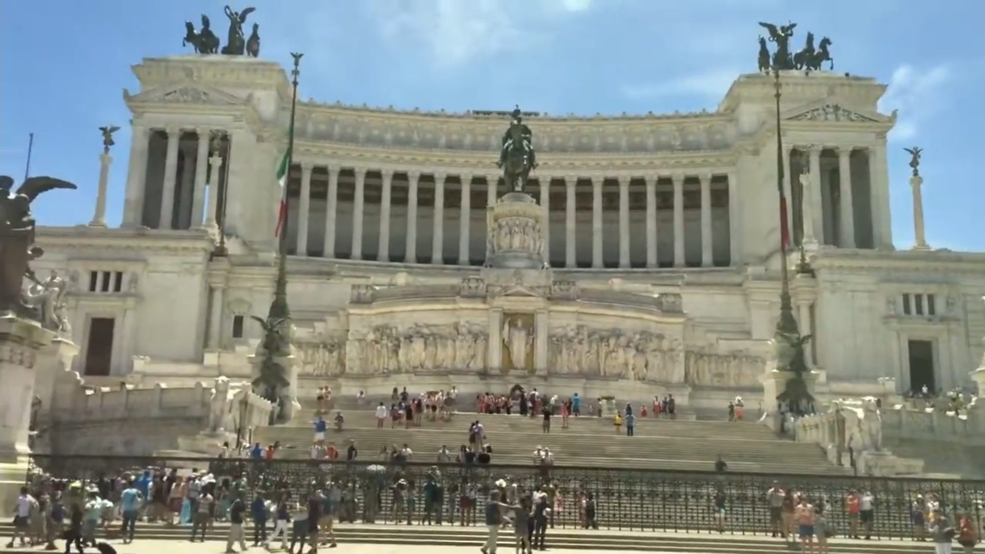 Rome's monuments seen from a moving tour bus window on an earlier trip — the view most cruise passengers settle for