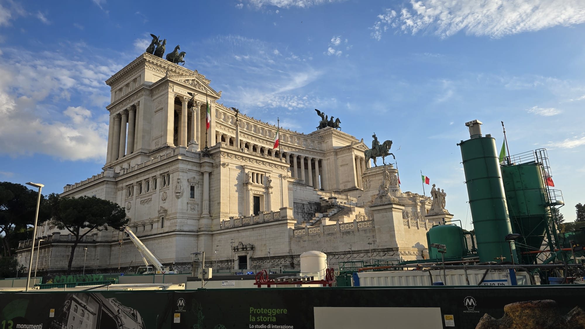 Piazza Venezia in Rome — the white marble Altare della Patria monument towering over the square in afternoon light