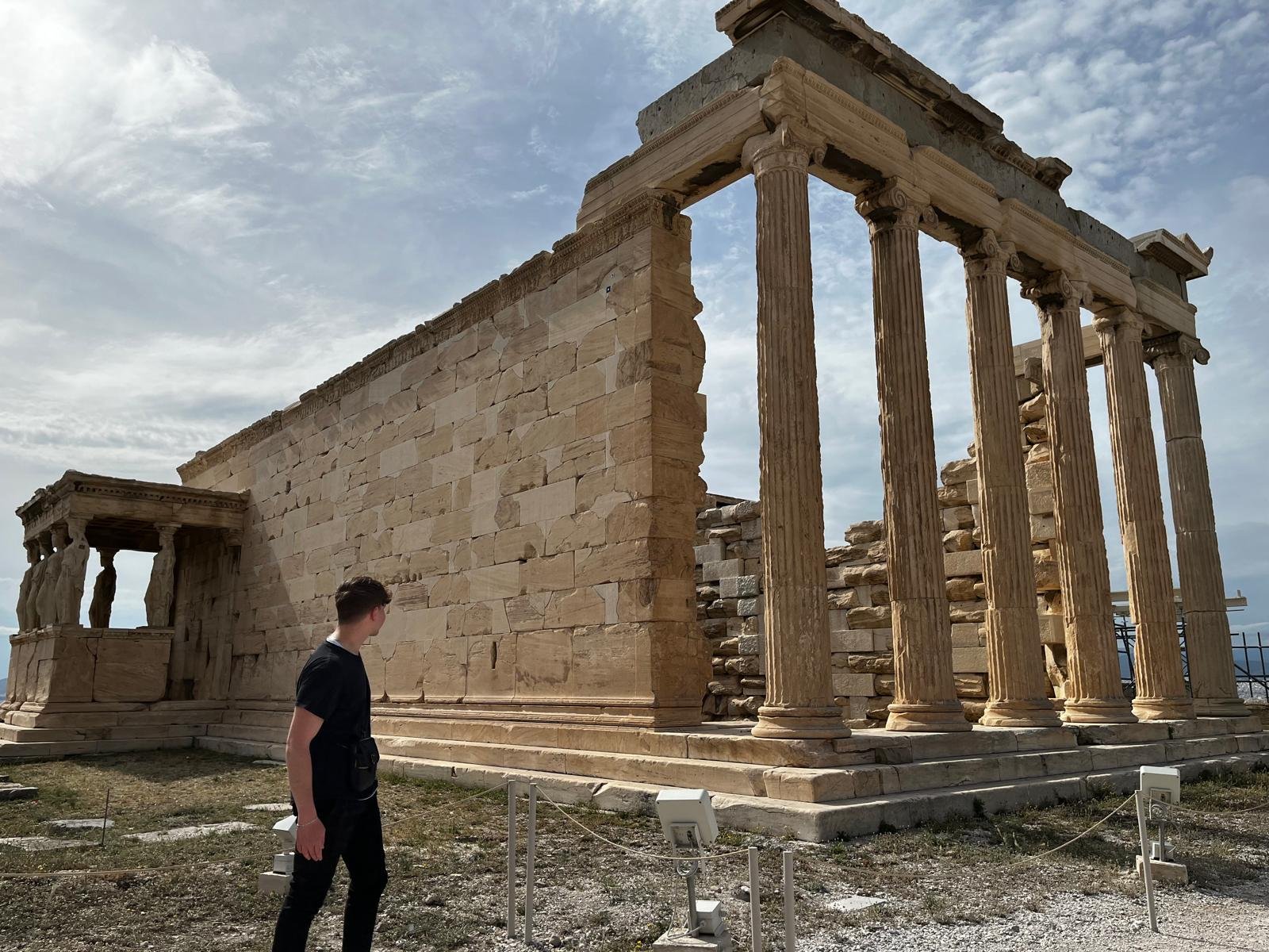 Yaron standing before the Erechtheion temple on the Acropolis of Athens